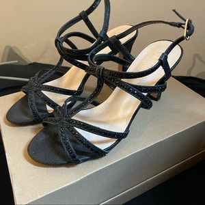 Black rhinestoned heels